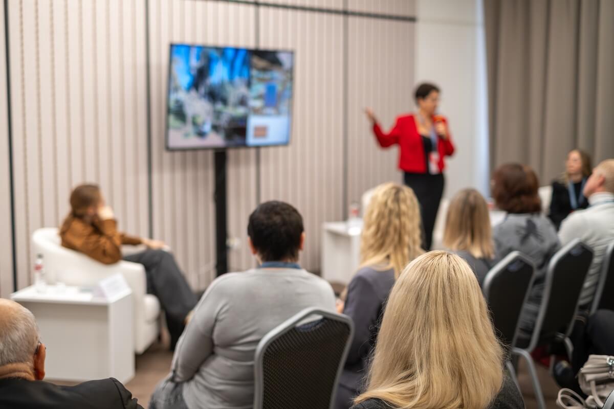 Business leader addressing her company