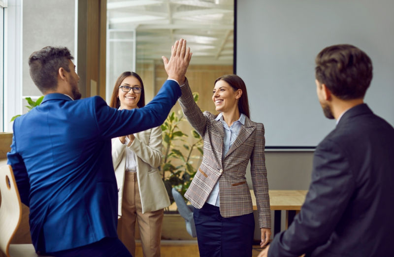 A leader effectively managing their team to greater heights