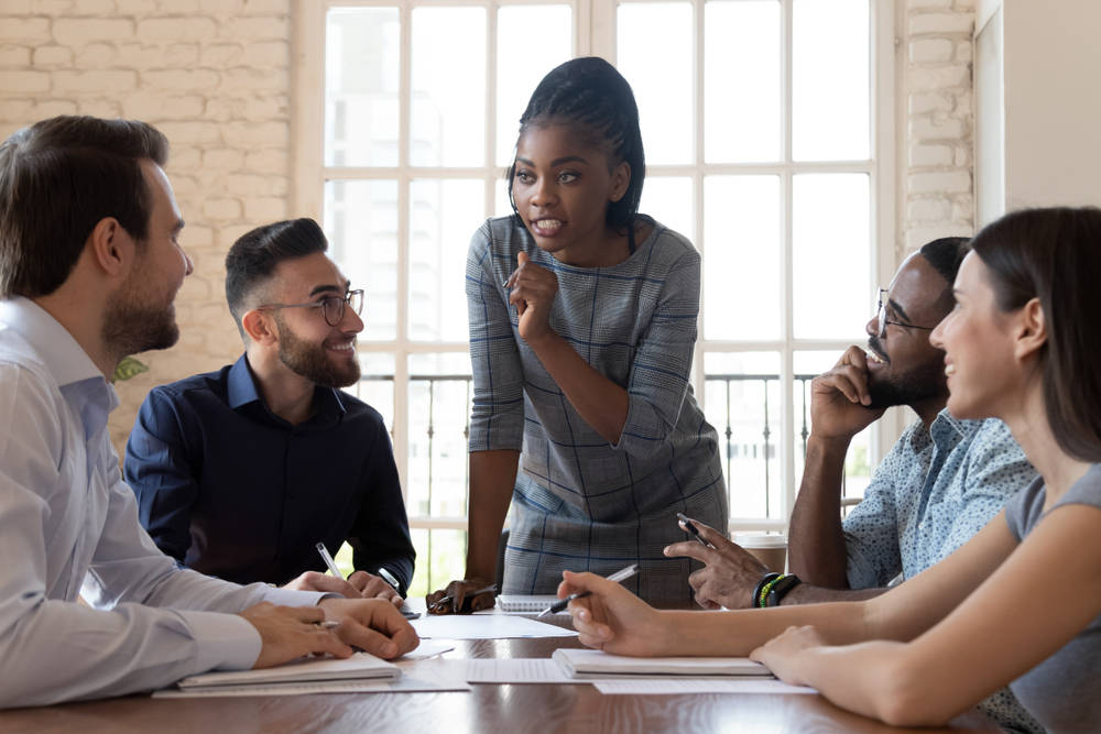 A business leader utilizing the servant leadership style