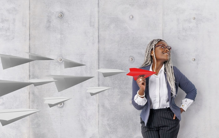 A woman anticipating becoming a strong leader in her organization