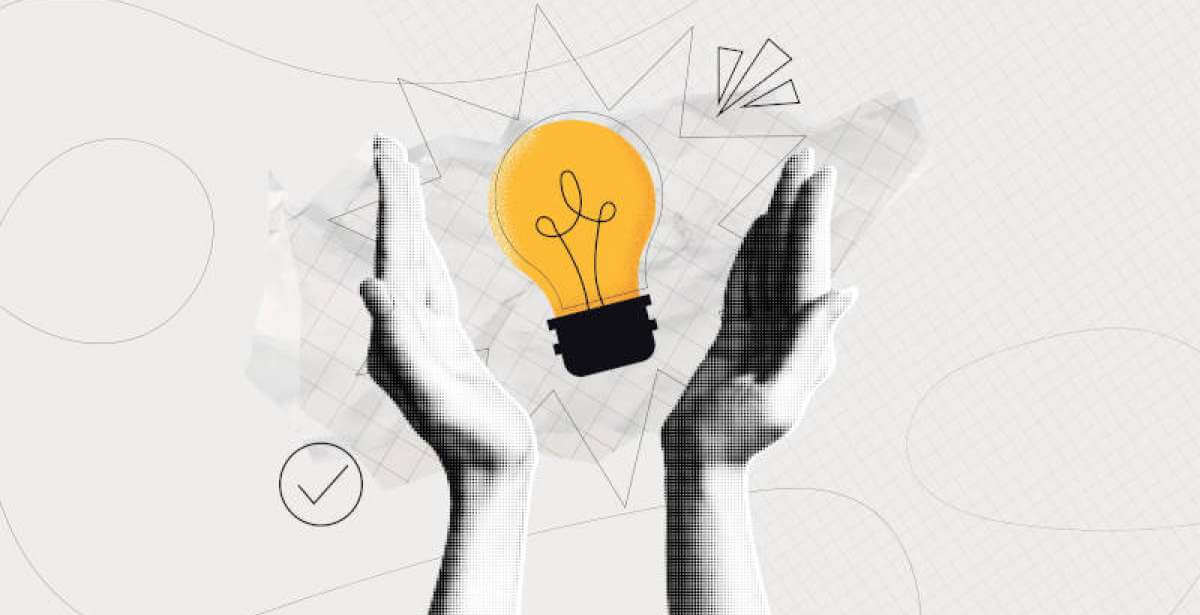 A pair of hands holding a lightbulb, representing innovation