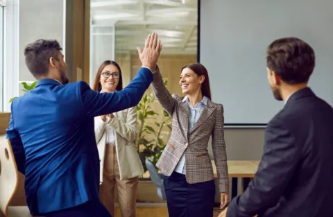 A leader effectively managing their team to greater heights